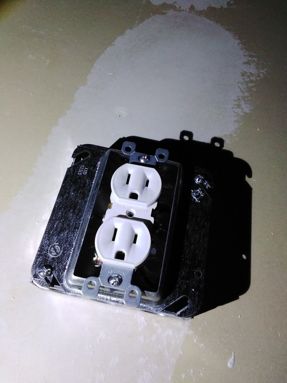 Here is a shot of the outlet wired up and mounted in the second room.