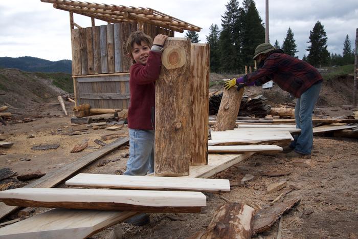 A small person helping Tuesday layout steps